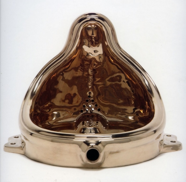 A shiny bronze replica of Marcel Duchamp's 1917 "Fountain," a commercially manufactured urinal.