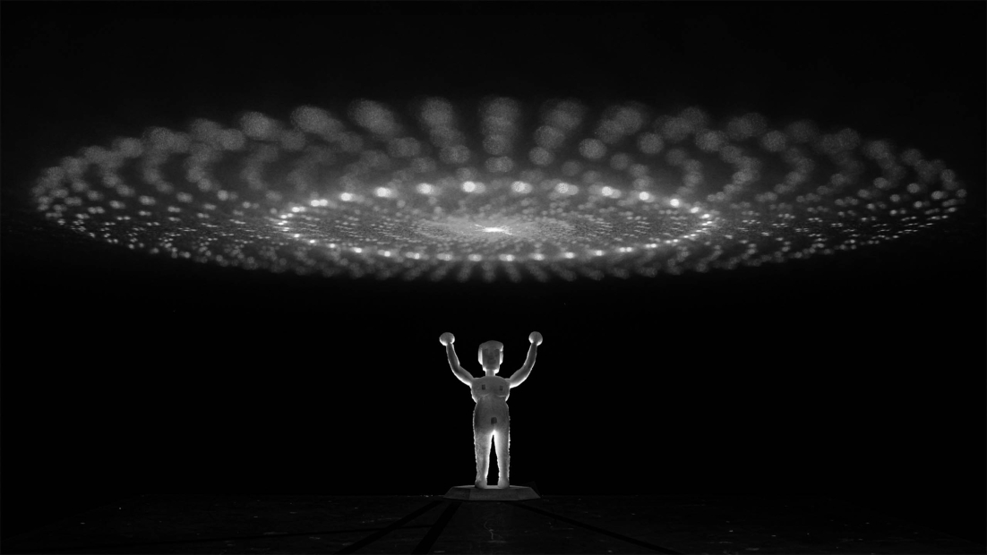Small figure holding its hands up under a large ellipse of light
