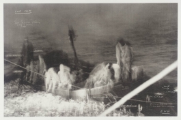 A blurry black-and-white photograph of people on a boat with small, white annotations. 