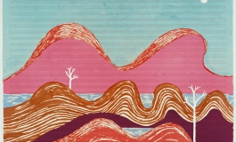 A print of a moonlit landscape of pink, orange, and red hills on lined music paper.