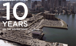 Graphic with aerial shot of Seaport neighborhood and harbor and the text "Celebrating 10 years on the waterfront"