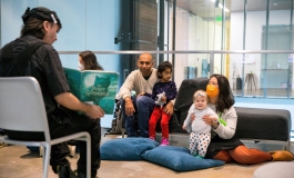 Parents and children attend a story time event