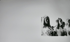 A screenprint on aluminum shows three newspaper clippings reproduced in black paint of young white women in various, unrelated scenes and poses.