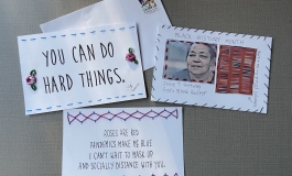 Various envelopes decorated with text, photos, and stitching