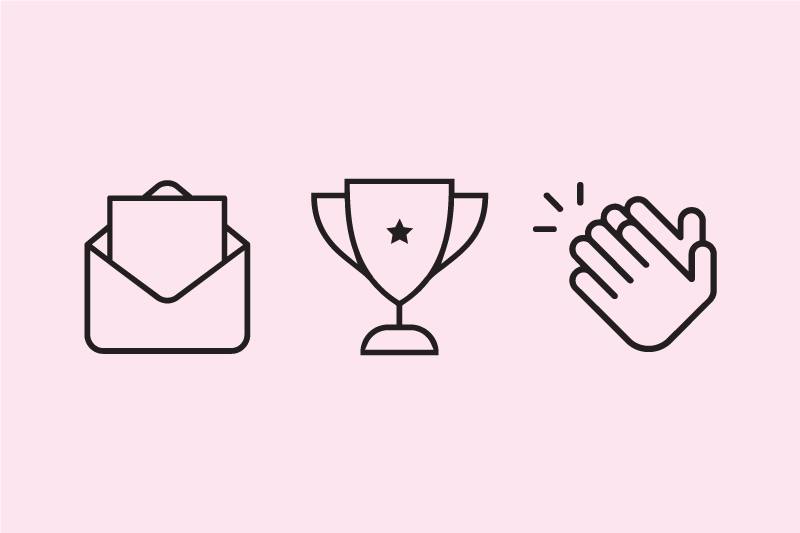 Icons of a paper in an open envelope, a trophy, and clapping hands. 