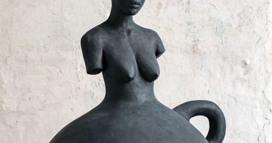 A sculpture by Simone Leigh of a female figure. 