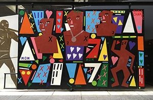 A mural consisting of colorful geometric shapes and simplified figures.