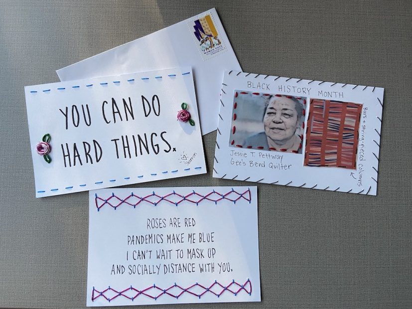 Various envelopes decorated with text, photos, and stitching