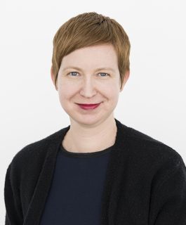 A headshot of educator Gabrielle Wyrick smiling in front of a white background