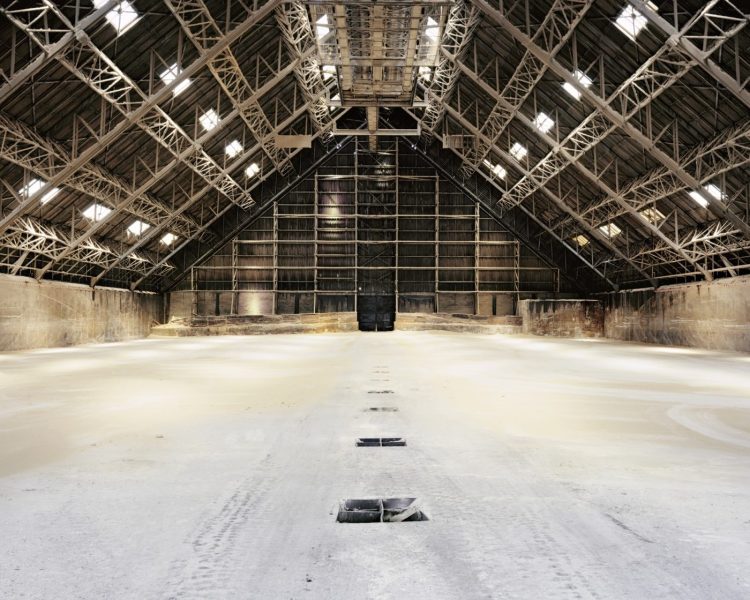 A photo of a large empty industrial space