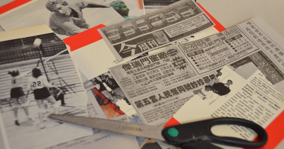 Scraps of cut-out newspapers and a pair of scissors on a surface.