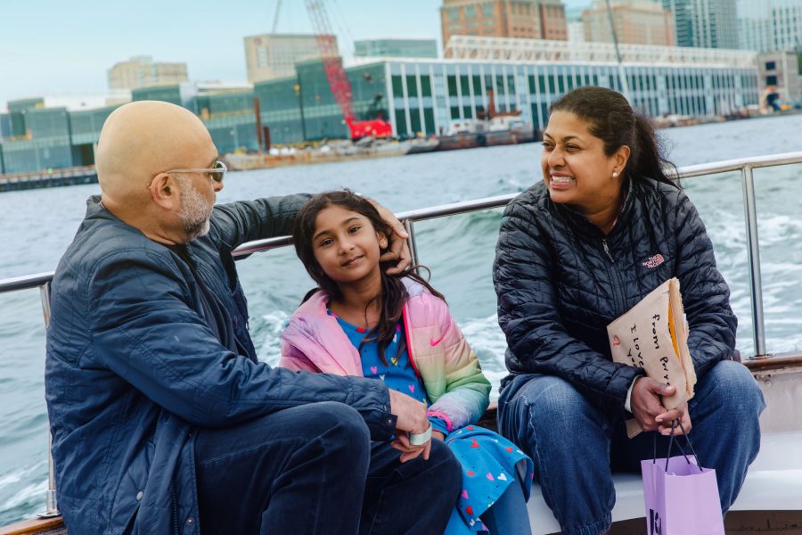 A family on an open top boat in Boston