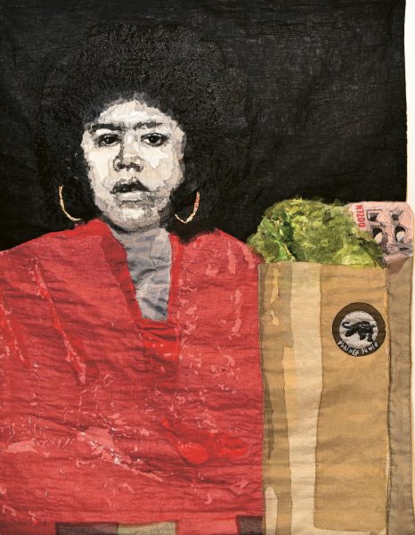 A textile artwork, part of AAMARP and shown at ICA Boston, depicts a woman with an afro and gold hoop earrings, wearing a red top, next to a grocery bag with lettuce and a pink item against a black background.