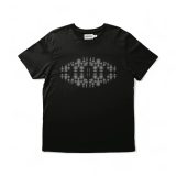 Black t-shirt featuring a symmetrical, abstract pattern in gray and white hues centered on the chest area, inspired by the geometric motifs of Caroline Monnet’s work at ICA Boston. The design resembles a blurred, modern motif.