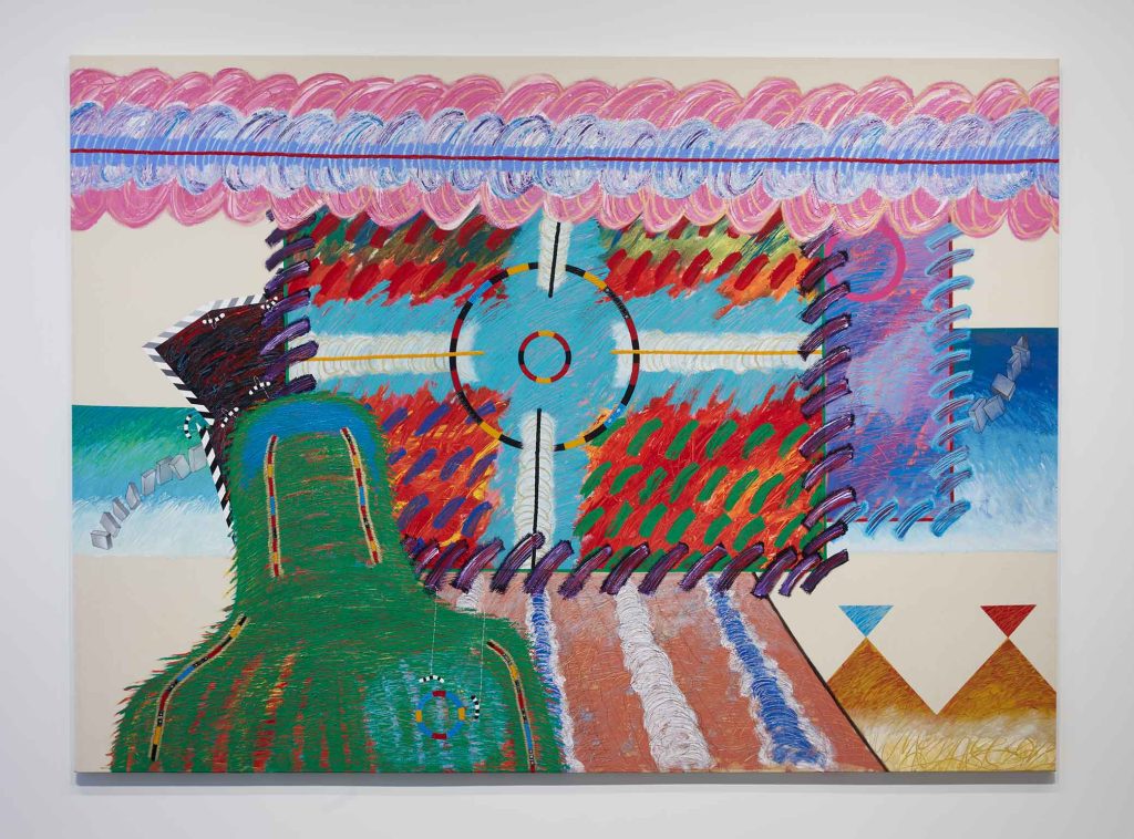 Colorful abstract painting with bold, textured brushstrokes. Features geometric shapes, zigzag and circular patterns, and vibrant hues of red, green, blue, and purple against a cream background.