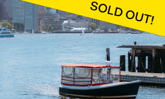 A small boat with a red canopy is docked by the water, city buildings in the background. A large yellow banner reading SOLD OUT! marks the ICA Tall Ship Cruise promotion in bold black letters, diagonally across the top right.