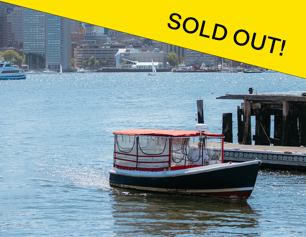 A small boat with a red canopy is docked by the water, city buildings in the background. A large yellow banner reading SOLD OUT! marks the ICA Tall Ship Cruise promotion in bold black letters, diagonally across the top right.